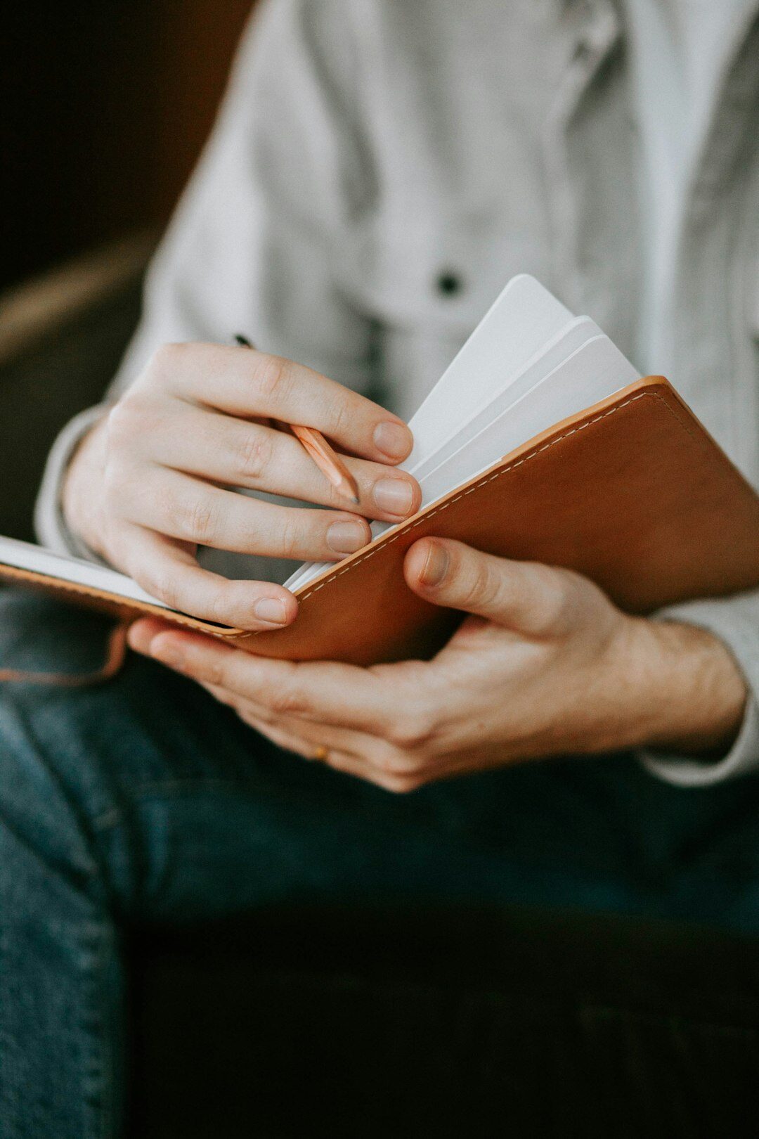 person journaling thoughts