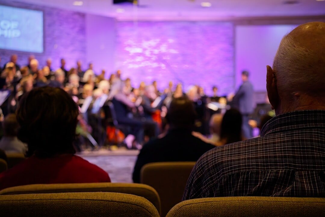 person speaking confidently in front of audience