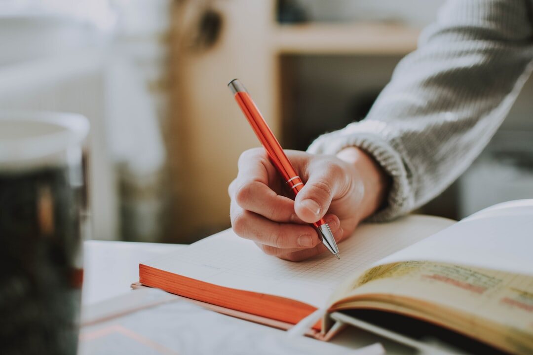 person journaling gratitude